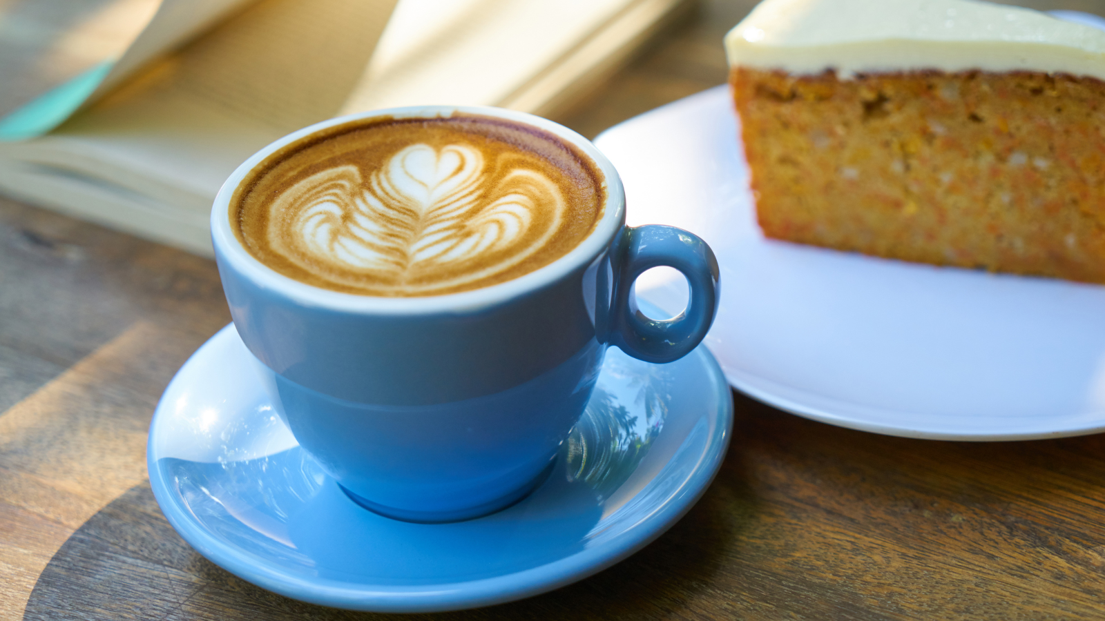 A sophisticated traveler enjoying specialty coffee in a quiet, atmospheric alleyway