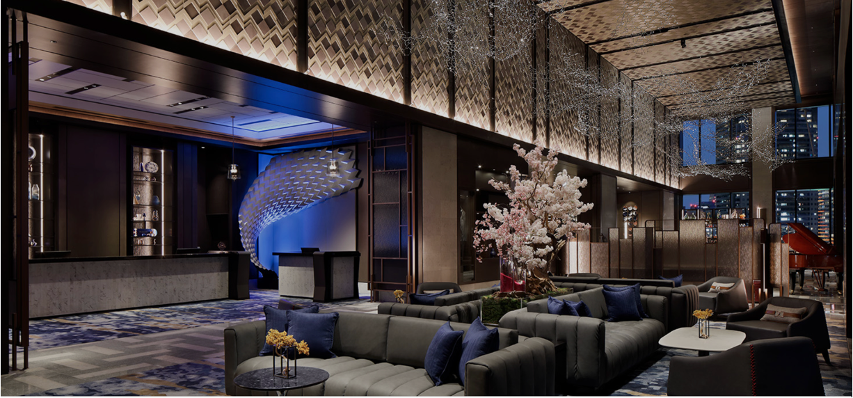 The glamorous balcony view or the sophisticated lobby of mesm Tokyo overlooking the waterfront
